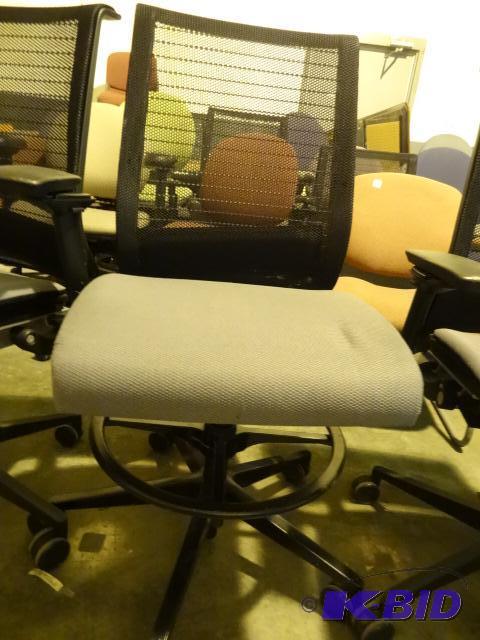 Steel Case adjustable height stool on wheels...