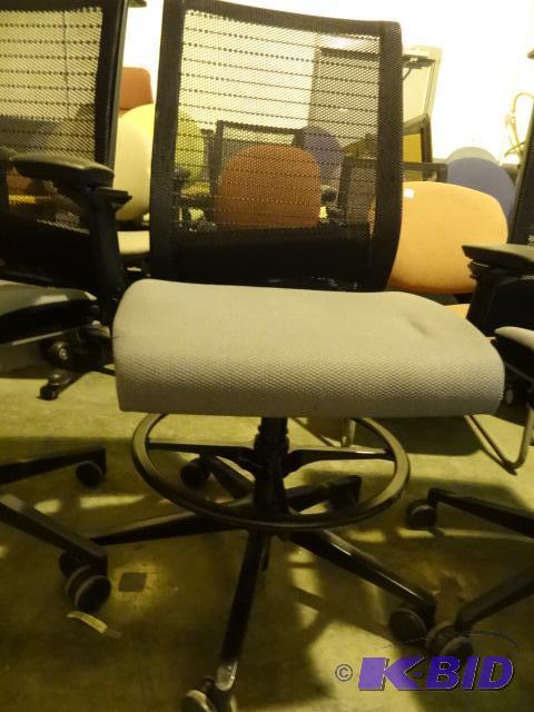 Steel Case adjustable height stool on wheels...