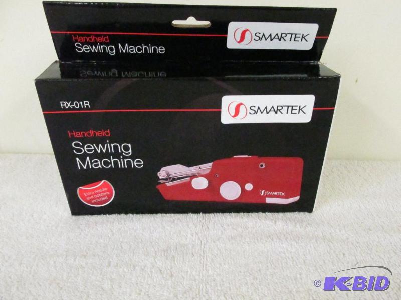 Hand Held Sewing Machine.