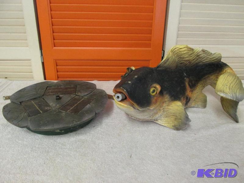 Solar Unit and Fish that Spouts Water