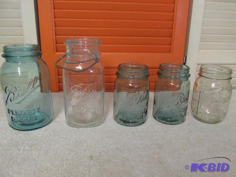 5 Canning Jars - some with little chips but they are too neat to throw away