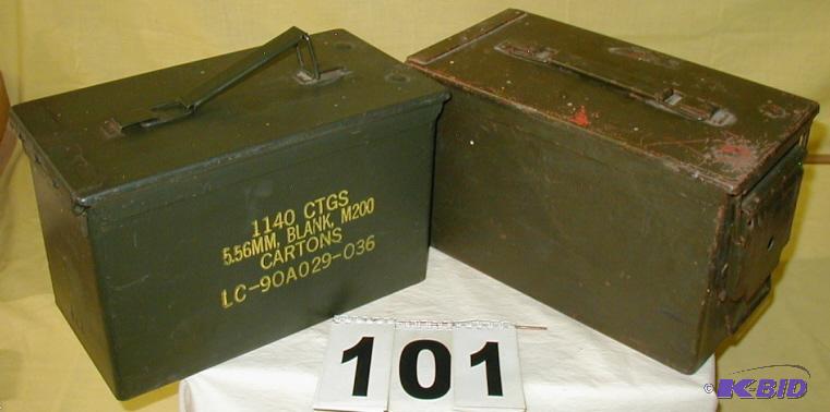 lot 101 image: Two Metal Ammo Boxes One box came with 5.56 m...