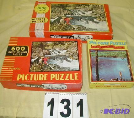 lot 131 image: Three Vintage Picture Puzzles with Ladies Fis...