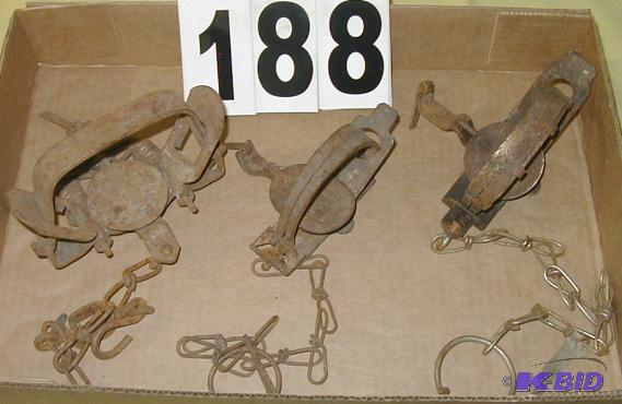 lot 188 image: Three Vintage Traps with Chains The double sp...