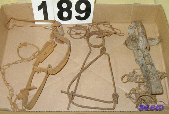 lot 189 image: Three Vintage Traps with Chains On the left i...