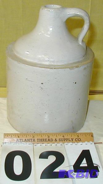 lot 24 image: Vintage One Gallon Shoulder Jug The bottom is...