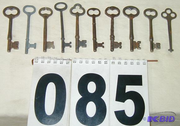 lot 85 image: Ten Vintage Skeleton Keys Some have stamped n...