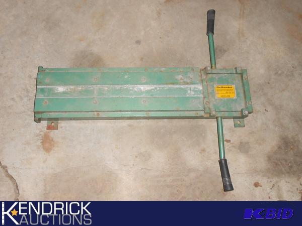 lot 12 image: Tin Knocker 24 Metal Cheek Bender