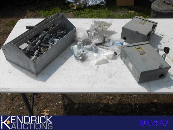 lot 135 image: 2 General Duty Square D Safety Switches and a tote full of attachments