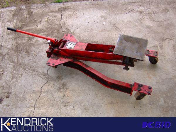 lot 166 image: Industrial Jack and Diesel Oil Filter