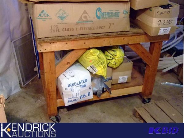 lot 85 image: Insulated Flex Ducting with Rolling Shop Bench