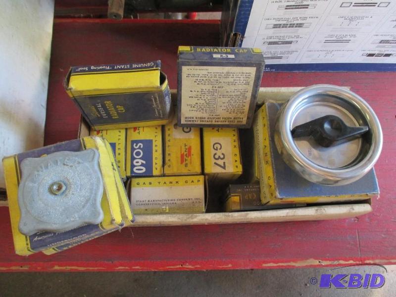lot 144 image: NOS Radiator Caps