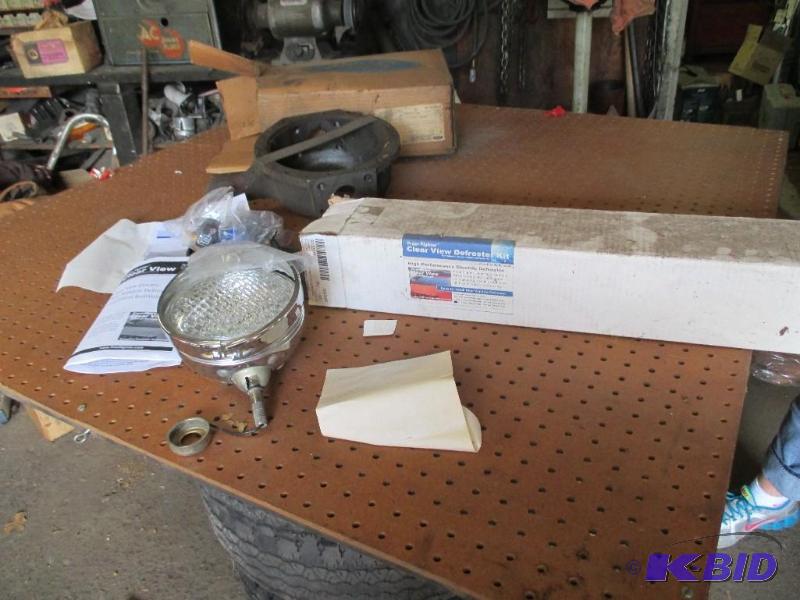 lot 171 image: Brand new Rear defroster, 600 ford rear end used, 1 old time head light - new