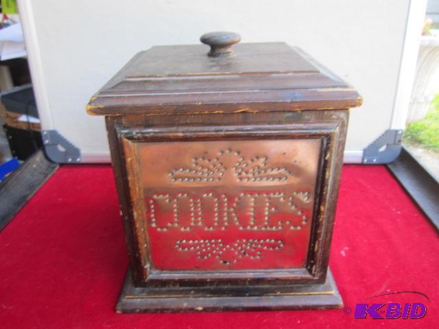 Vintage copper impression on wood cookie jar....