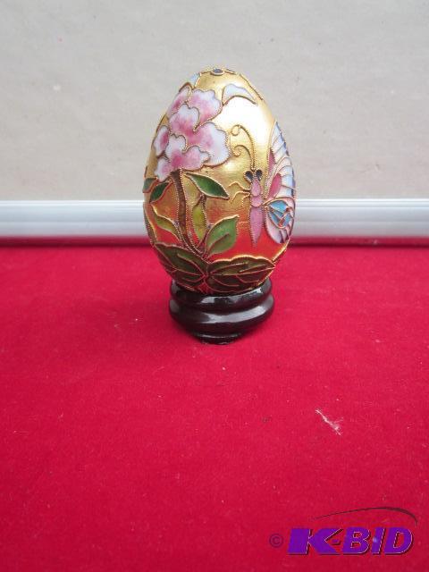 3 inch porcelain gold gilded egg on stand. &n...