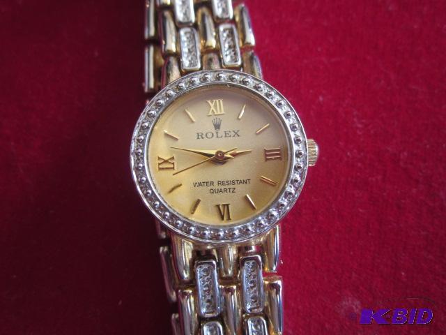 Womens Rolex gold faced watch.&nbsp Unsure ...