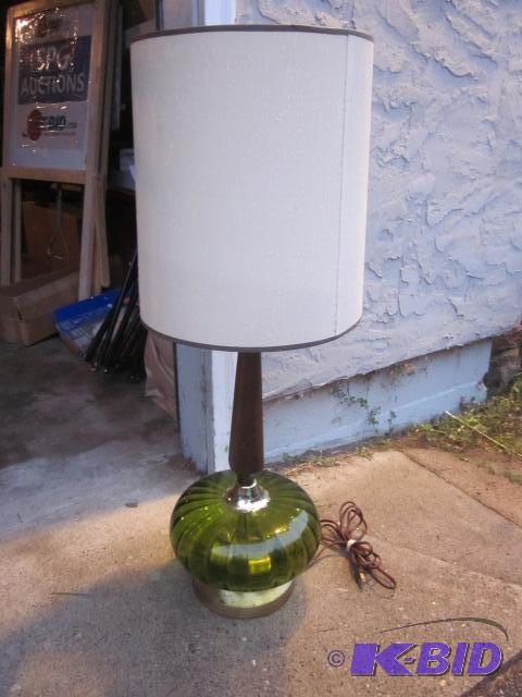 Mid Century green glass, wood, and brass lamp...
