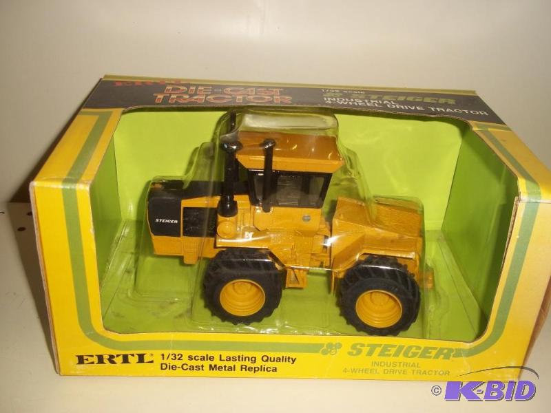 lot 12 image: ERTL Toys Steiger Industrial 4 Wheel Drive Tr...