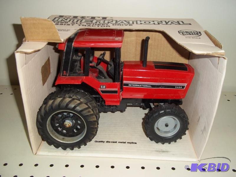 lot 15 image: ERTL Toys International 5488 Tractor with all...