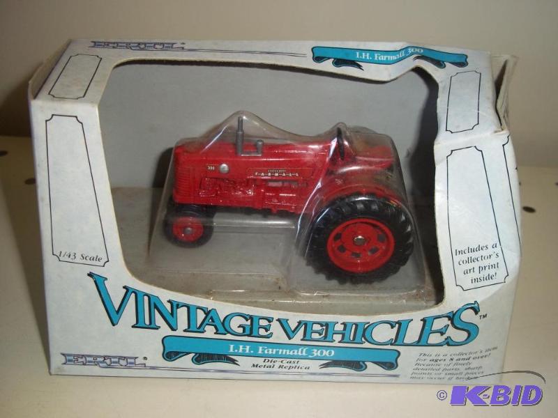lot 23 image: ERTL Toys Farmall 300 Tractor with original p...