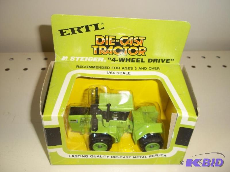 lot 54 image: ERTL Toys Steiger Cougar Tractor with origina...