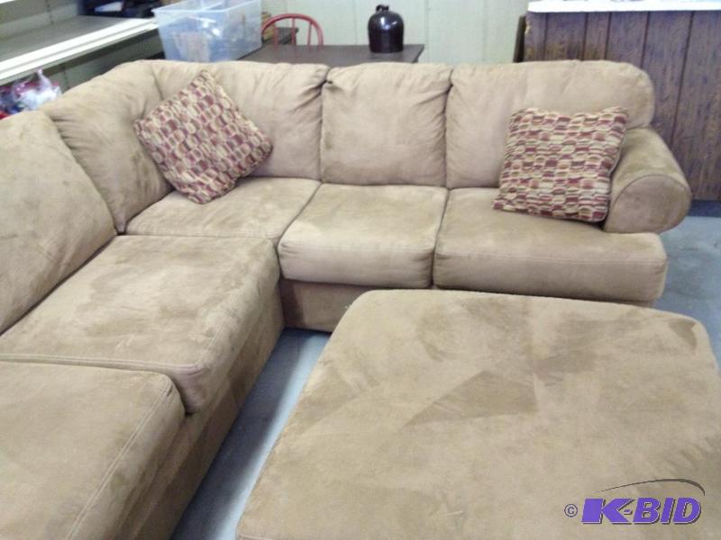 lot 12 image: Large Ashley Furniture 4 Piece Sectional Couch