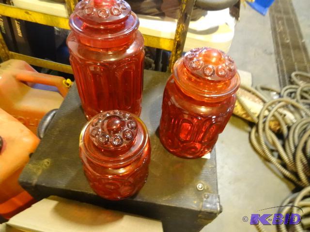 lot 101 image: 3 vintage red glass canisters...