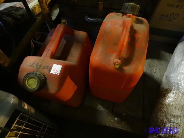 lot 104 image: Qty 2 gas cans. 2.5 gal...