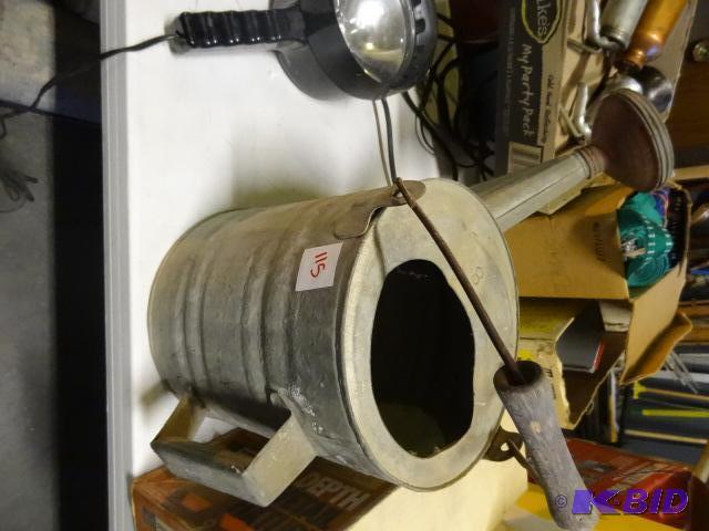 lot 115 image: Stainless watering can...