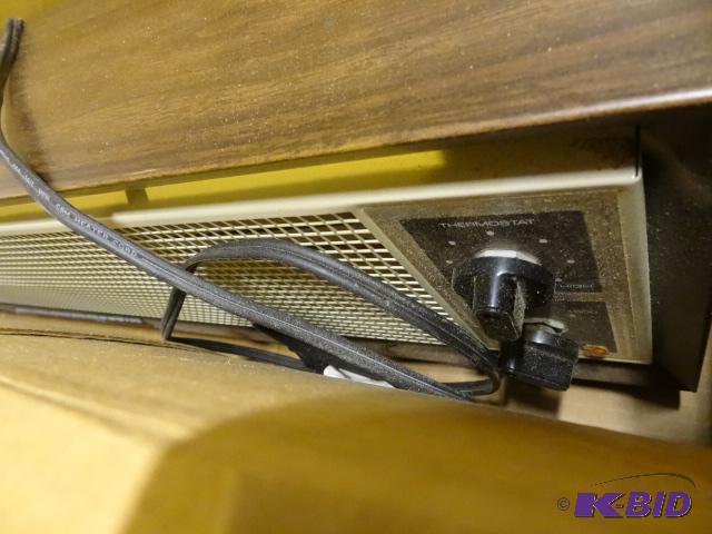 lot 120 image: Titan by Rival wood tone electric heater. Mod...