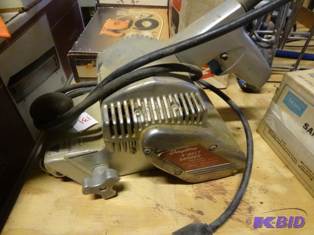 lot 131 image: Dayton 4" belt sander...