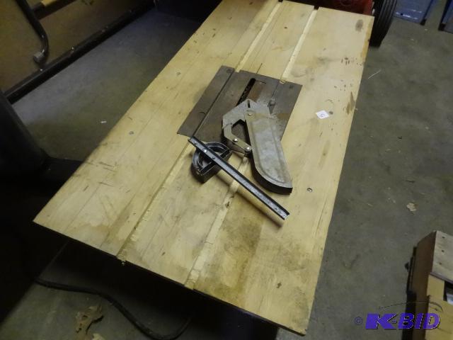 lot 5 image: Table saw with custom table and cabinet. Can ...