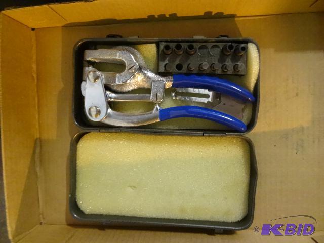 lot 66 image: Metal round hole hand punch tool...