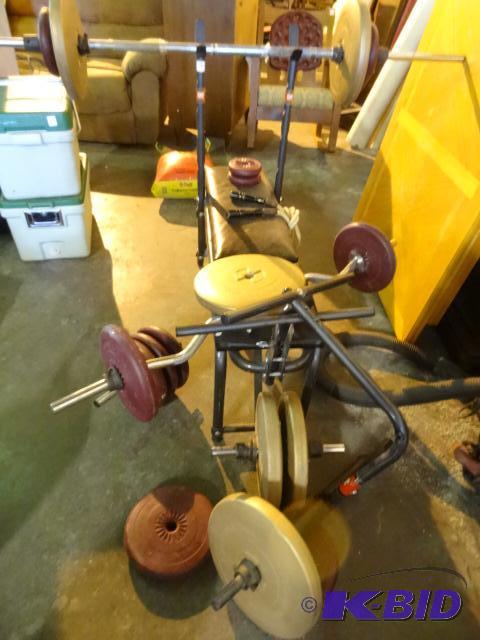 lot 88 image: Weight bench with misc weights and weight bar...