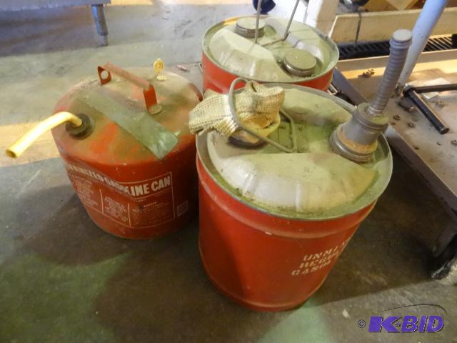 lot 92 image: 6 metal gas cans...