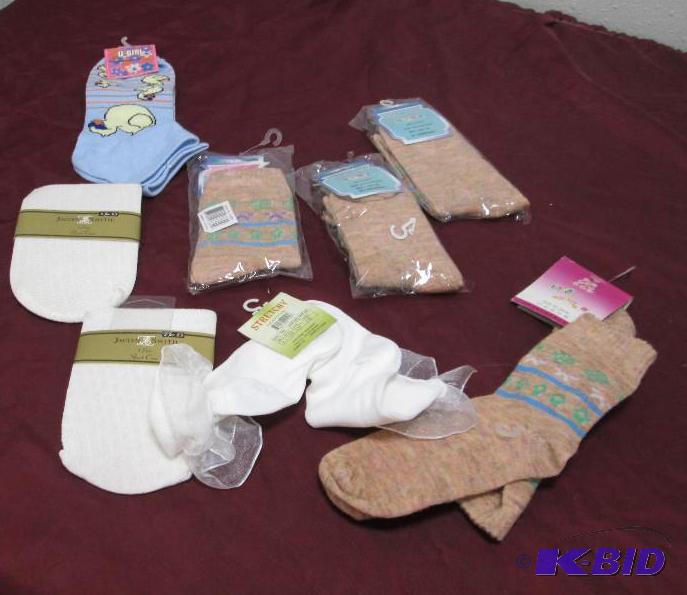 Qty 7 socks different colors and sizes and 2 ...