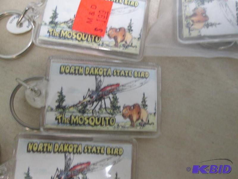 Qty 48 key chains that says North Dakota Soui...