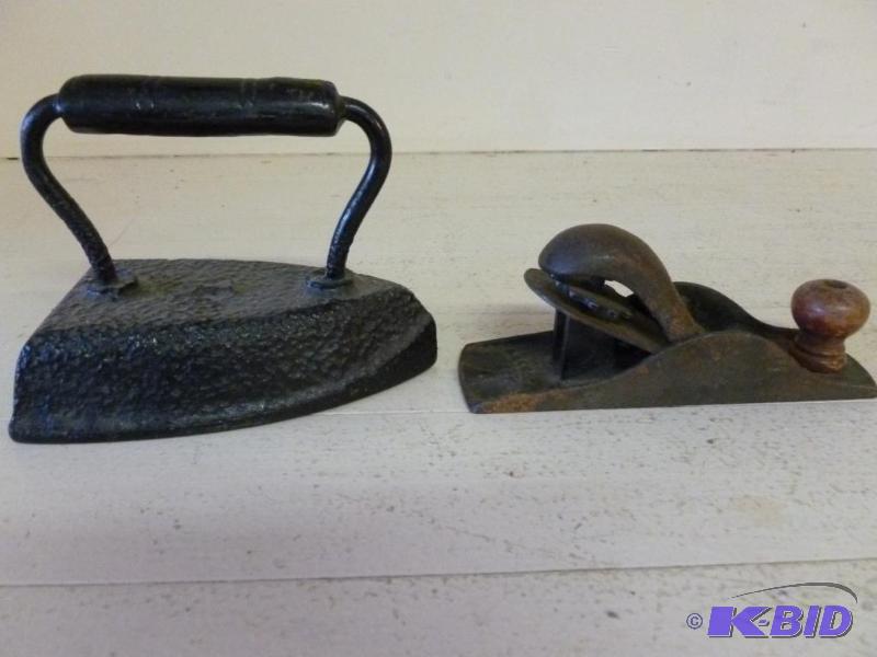 lot 183 image: This lot consists of an antique iron with han...