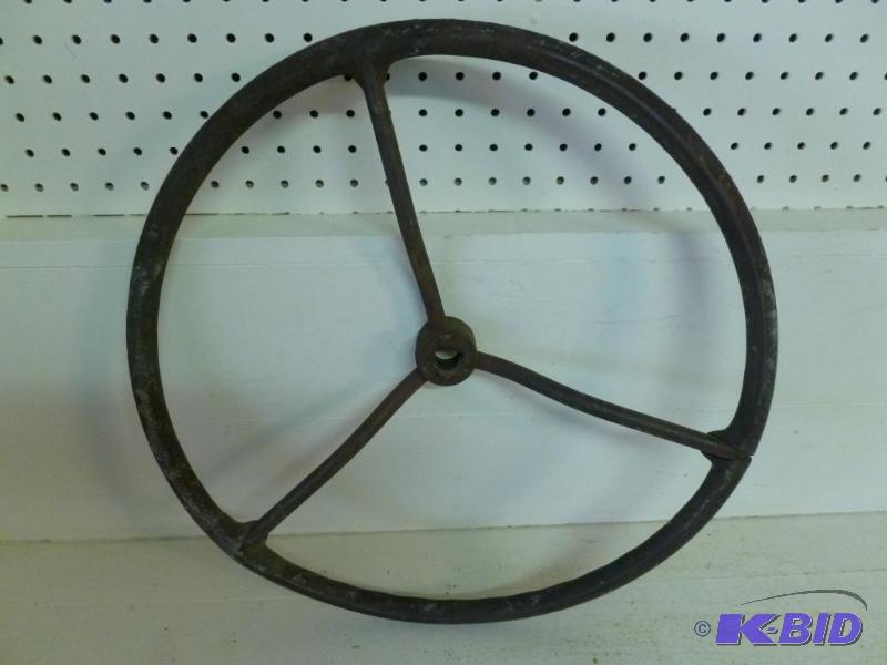 lot 189 image: Large vintage tractor steering wheel that mea...