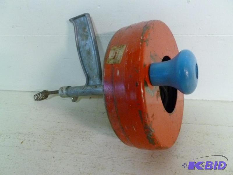 lot 204 image: Heavy duty hand crank sewer snake, good usabl...
