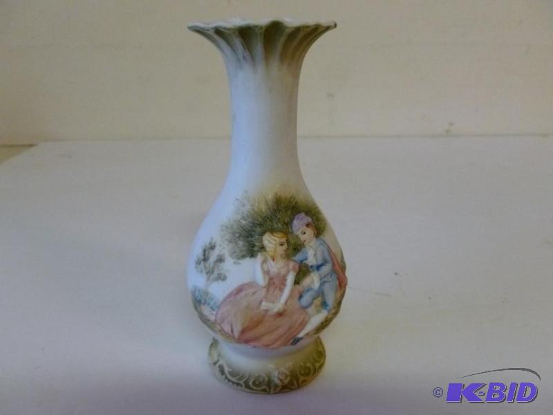 lot 62 image: Beautiful embossed porcelain vase that measur...