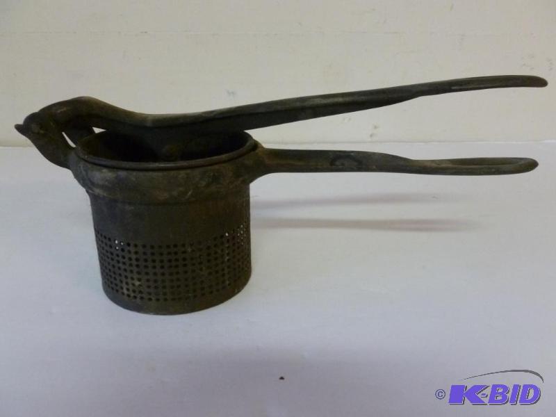 lot 74 image: Vintage cast iron handled ricer, working cond...