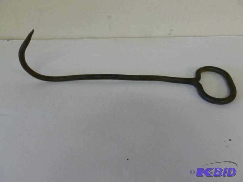 lot 90 image: Large antique iron bale hook that measures 16...