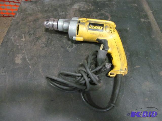 lot 79 image: Dewalt 38 Drill  Features & Notes   All...
