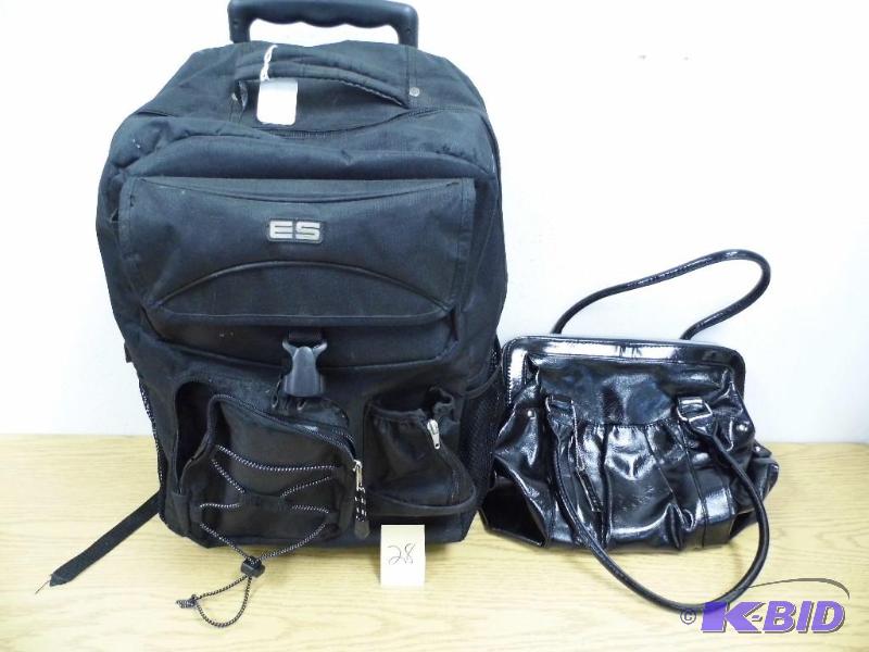 lot 28 image: Rolling Backpack