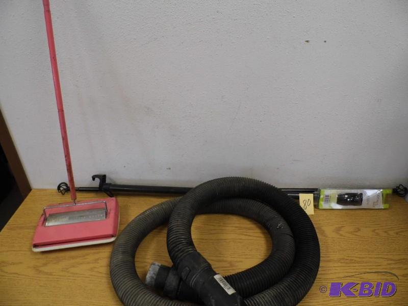 lot 80 image: Clothes Bar, Curtain Rod and Bissell