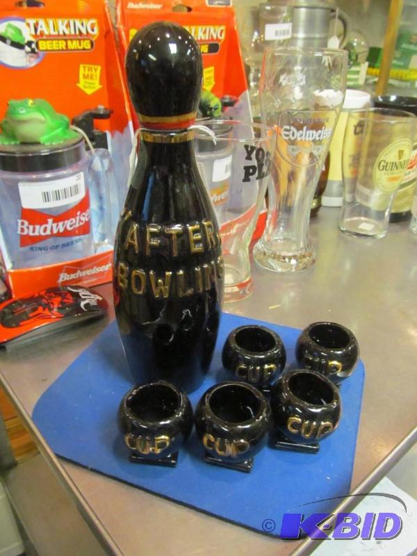 lot 23 image: Vintage After Bowling Liquor dispensor with 5 cups.