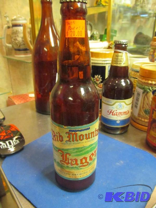 lot 38 image: RARE Rib Mountain Lager beer bottle