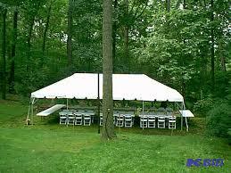 20x40 white pole tent, comes with sides, pole...