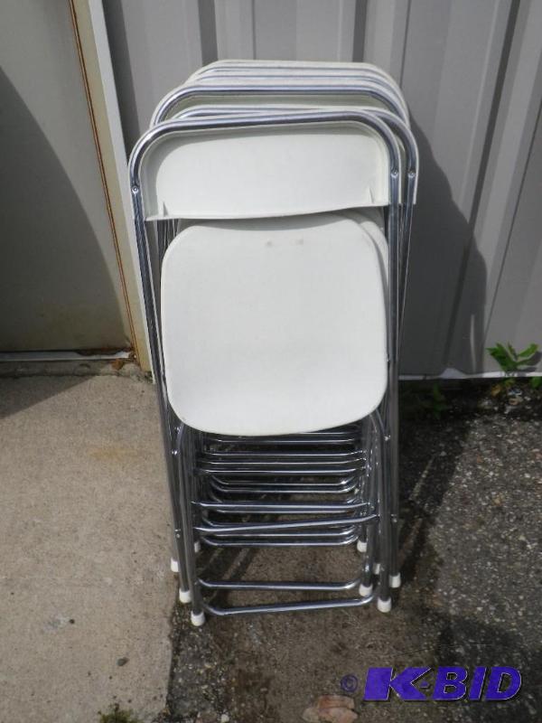 10 white plastic folding chairs with chrome f...